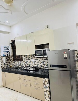 Kitchen in 2 BHK Builder Floor at Ramesh Nagar – for Rent