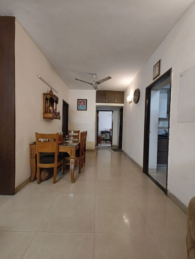 Living Room, unitech-uniworld-gardens-2 3.5 Bedroom 1475 Sq.Ft. Apartment In Sector 47 Gurgaon 10704441