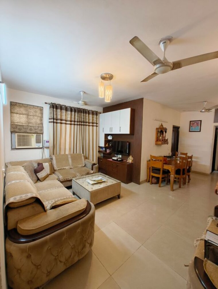 Living Room, unitech-uniworld-gardens-2 3.5 Bedroom 1475 Sq.Ft. Apartment In Sector 47 Gurgaon 10704441