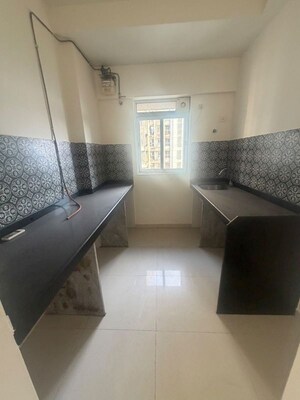 Living Room in 1 BHK Apartment at Lodha Amara, Kolshet Road – for Rent