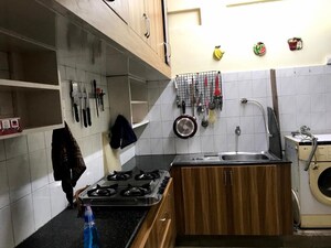 Kitchen in 2 BHK Apartment at Mahatma Gandhi Road – for Rent