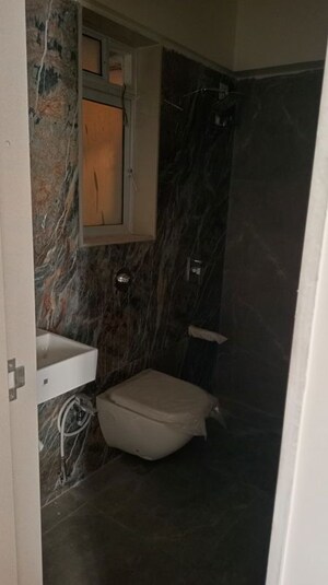 Bathroom in 1 BHK Apartment at Piramal Revanta, Mulund West – for Rent