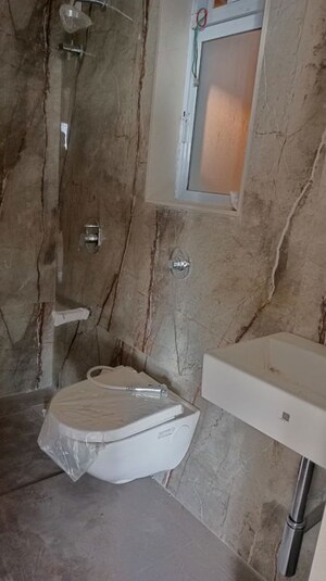 Bathroom in 1 BHK Apartment at Piramal Revanta, Mulund West – for Rent