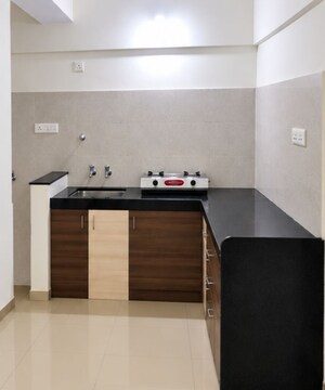Kitchen in 1 BHK Apartment at Ayaan Society , Wagholi – for Sale