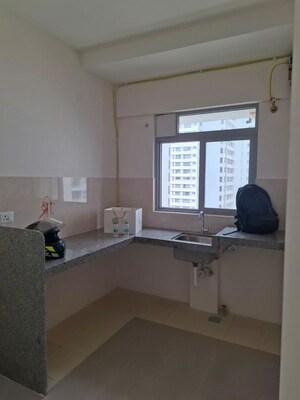 Kitchen in 2 BHK Apartment at Piramal Vaikunth, Balkum Pada – for Rent