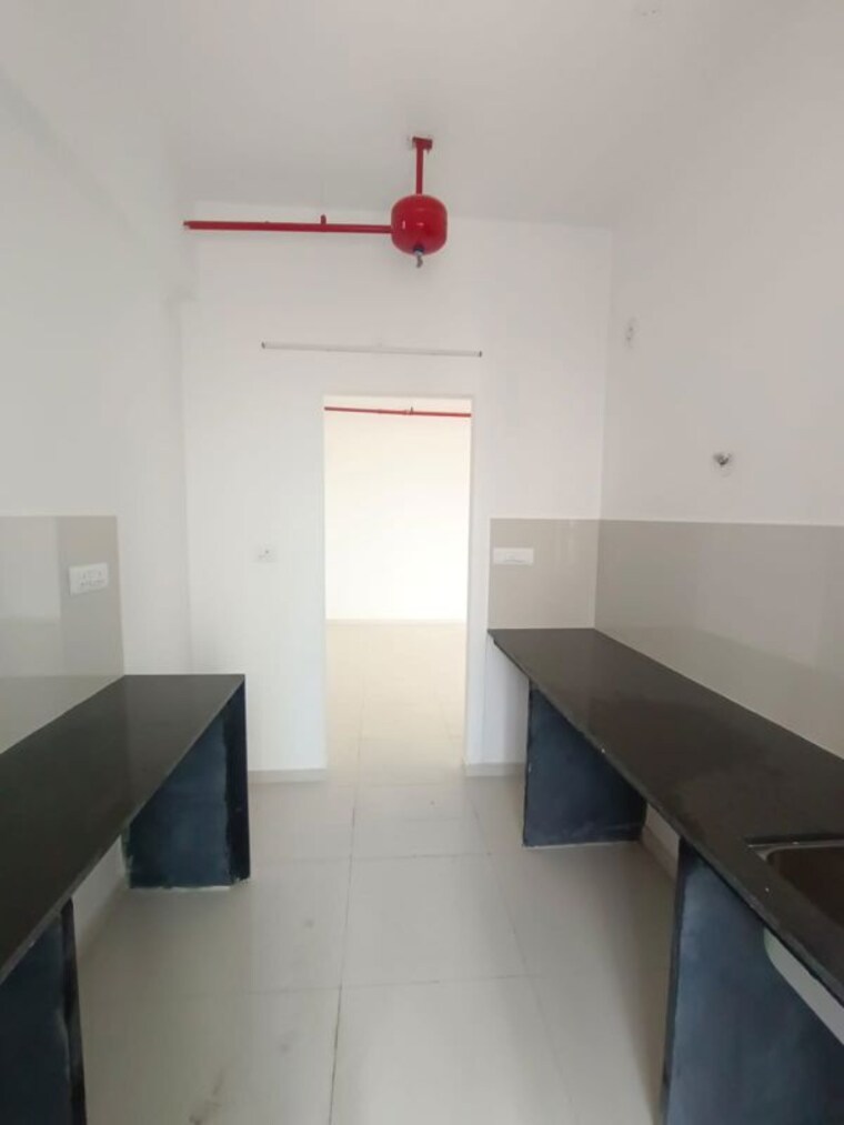 Kitchen, runwal-the-central-park 2 Bedroom 860 Sq.Ft. Apartment In Chinchwad Pune 10704868