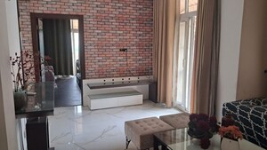 Living Room in 5 BHK Penthouse at Amrapali Silicon City, Sector 76 – for Sale