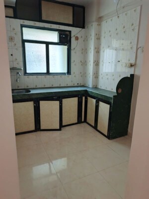 Kitchen in 2 BHK Apartment at Dev Mangal Co Op Hsg Society, Kharghar – for Rent