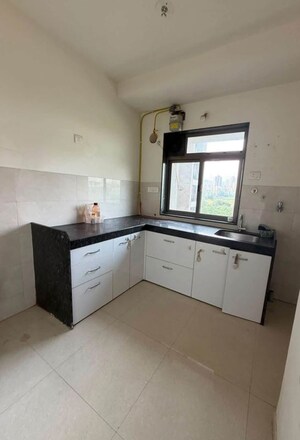 Kitchen in 1 BHK Apartment at Runwal Eirene, Balkum Pada – for Rent