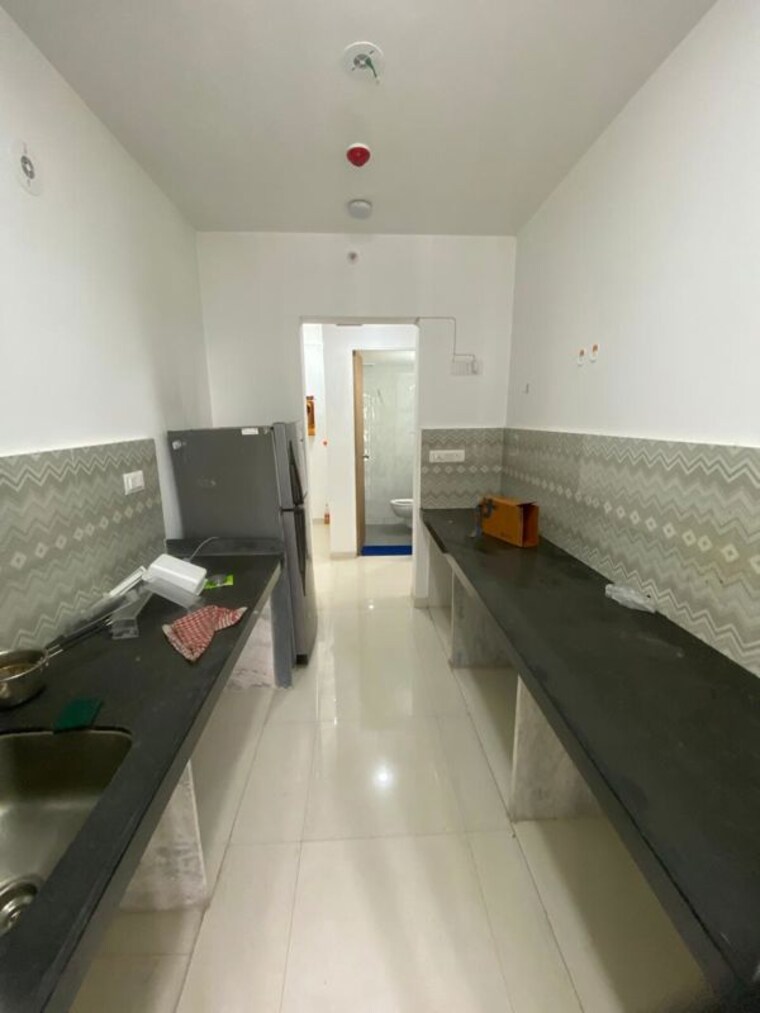 Kitchen, lodha-palava-downtown-dombivli-east 1 Bedroom 353 Sq.Ft. Apartment In Dombivli East Thane 10704884