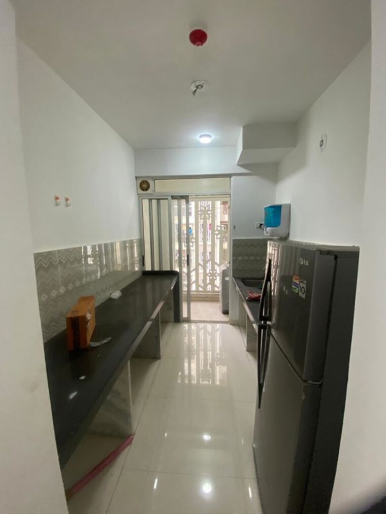 Kitchen, lodha-palava-downtown-dombivli-east 1 Bedroom 353 Sq.Ft. Apartment In Dombivli East Thane 10704884