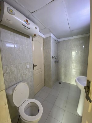 Bathroom in 4 BHK Builder Floor at Sector 23a – for Rent