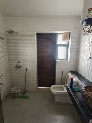 Bathroom in 4 BHK Builder Floor at Sector 23a – for Rent