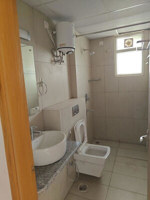 Bathroom in 4 BHK Builder Floor at Sector 21 – for Rent