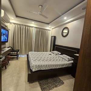 Bedroom in 3 BHK Builder Floor at Ansal Sushant Lok I, Sector 43 – for Rent