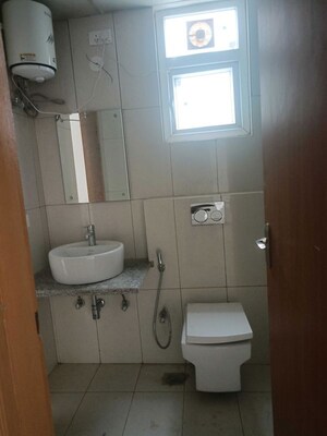 Bathroom in 4 BHK Builder Floor at Sector 23 – for Rent