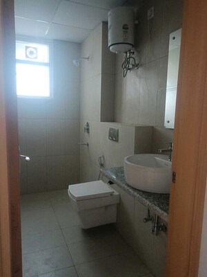 Bathroom in 4 BHK Builder Floor at Sector 23 – for Rent