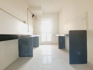 Kitchen in 2 BHK Apartment at Godrej Emerald, Ghodbunder Road – for Rent