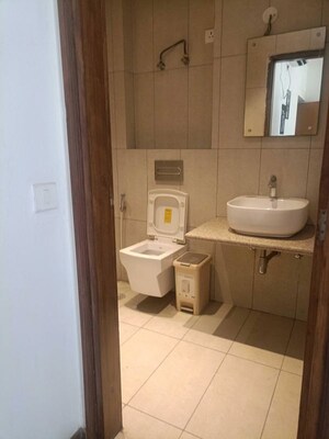 Bathroom in 4 BHK Builder Floor at Sector 21 – for Rent