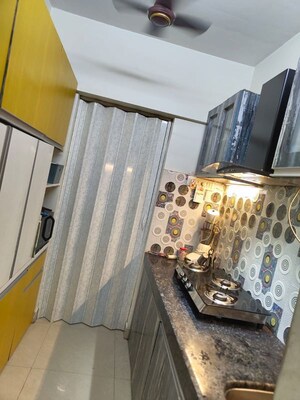 Kitchen in 1 BHK Apartment at DB Realty Orchid Ozone, Ketkipada – for Sale