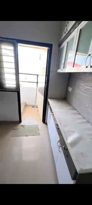 Kitchen in 2 BHK Apartment at Sthapatya Pratham Lakeview, Science City – for Rent