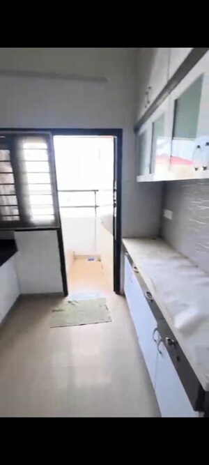 Kitchen in 2 BHK Apartment at Sthapatya Pratham Lakeview, Science City – for Rent