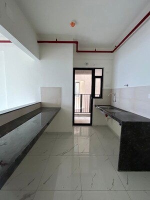 Kitchen in 2 BHK Apartment at Mahindra Nestalgia, Pimpri – for Rent