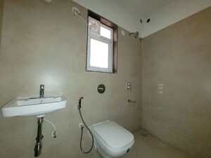Bathroom in 2 BHK Apartment at Puranik City Reserva, Ghodbunder Road – for Rent