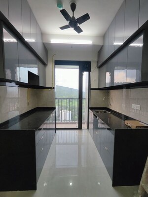 Kitchen in 2 BHK Apartment at Damji Shamji Mahavir Spring Tulip Phase 1, Pokhran Road No Two – for Rent