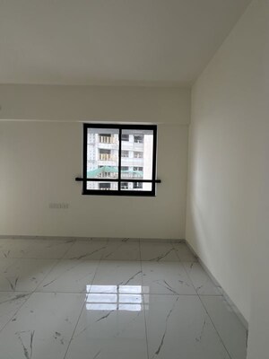 Building Lobby in 2 BHK Apartment at Mahindra Nestalgia, Pimpri – for Rent