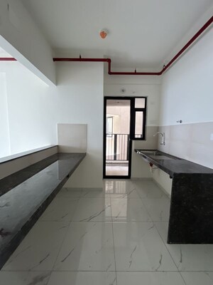 Kitchen in 2 BHK Apartment at Mahindra Nestalgia, Pimpri – for Rent