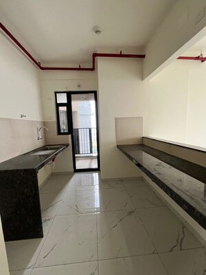 Kitchen in 2 BHK Apartment at Mahindra Nestalgia, Pimpri – for Rent