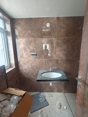 Bathroom in 4 BHK Apartment at Sumadhura The Olympus, Financial District – for Rent