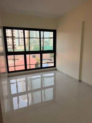 Room in 2 BHK Apartment at Grant Road – for Sale