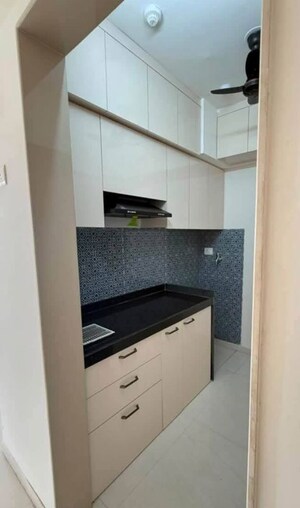 Kitchen in 2 BHK Apartment at Lodha Crown Quality Homes, Majiwada – for Rent