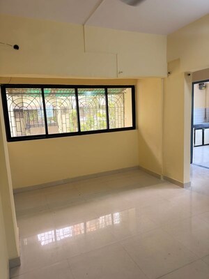 Bedroom in 1 BHK Apartment at Suryodaya Apartments, Seawoods Sector 48 – for Rent