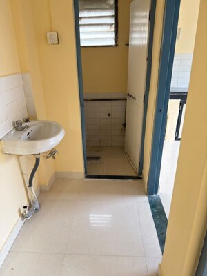 Bathroom in 1 BHK Apartment at Suryodaya Apartments, Seawoods Sector 48 – for Rent