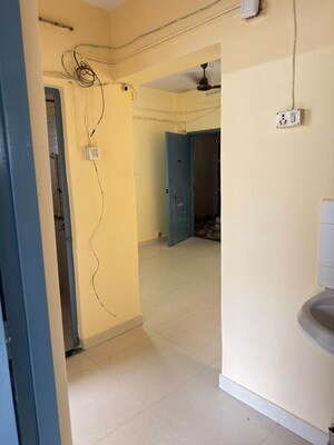 Building Lobby in 1 BHK Apartment at Suryodaya Apartments, Seawoods Sector 48 – for Rent