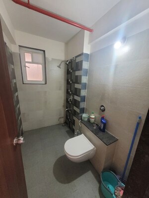 Bathroom in 3 BHK Apartment at Gini Vivante, Kiwale – for Rent