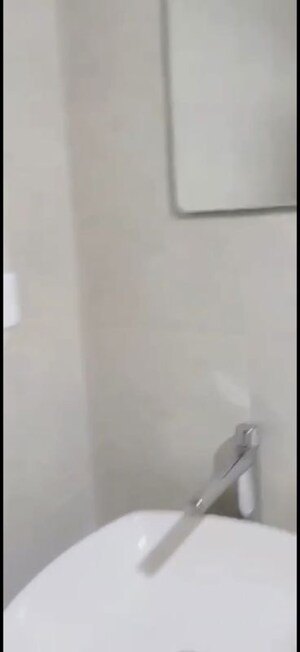Bathroom in 3 BHK Apartment at Bhartiya City Nikoo Homes 4, Thanisandra Main Road – for Rent