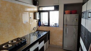 Kitchen in 2 BHK Apartment at Aakar Residency, Kavesar – for Sale