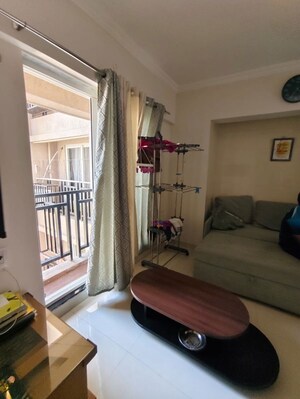 Living Room in 1 BHK Apartment at Raunak Bliss, Ghodbunder Road – for Rent