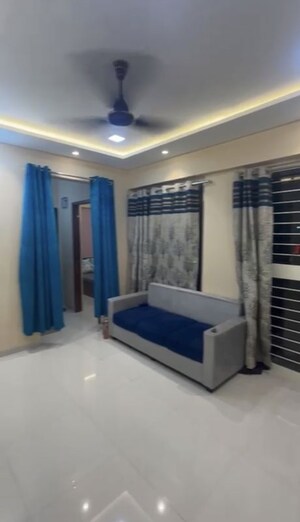 Living Room in 1 BHK Apartment at Redshift Bloomville, Hinjewadi – for Rent