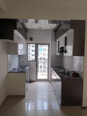 Kitchen in 2.5 BHK Apartment at Gulshan Bellina, Sector 16 Greater Noida – for Rent