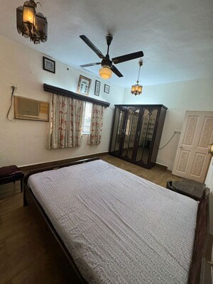 Bedroom in 2 BHK Apartment at Chandak Cornerstone, Worli – for Rent