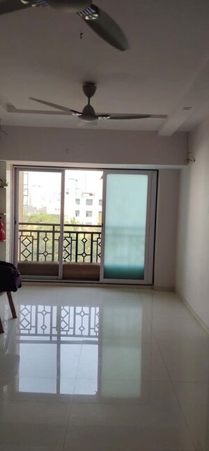 Living Room in 2 BHK Apartment at Cosmos Orchid, Ghodbunder Road – for Rent