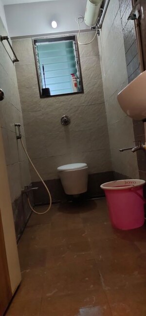 Bathroom in 2 BHK Apartment at Cosmos Orchid, Ghodbunder Road – for Rent