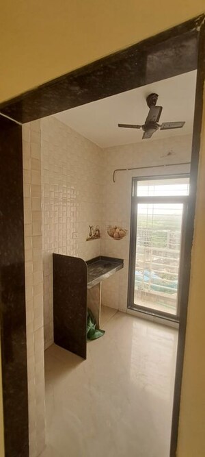 Kitchen in 1 BHK Apartment at Eden Garden II, Sector 52 Dronagiri – for Sale