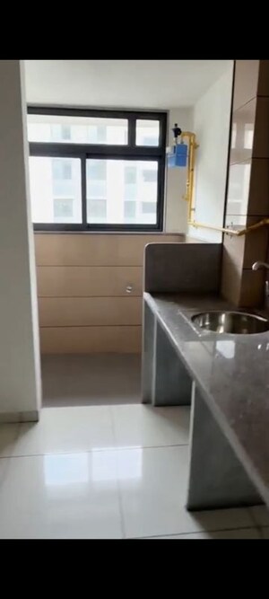 Kitchen in 2 BHK Apartment at Sun Footprints, Shela – for Rent