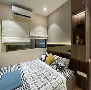 Bedroom in 2 BHK Apartment at Agraraj Lumina Towers, Baner – for Rent